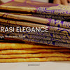 “Stack of traditional Banarasi silk sarees in gold and purple with intricate brocade weaving – Indiehaat Banarasi collection display.”