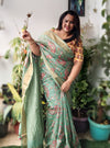 Incandescent Silk Linen Embroidered Green Saree