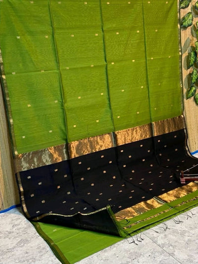Handloom Maheshwari silk saree, green body with flower buti, black contrast pallu and golden zari border