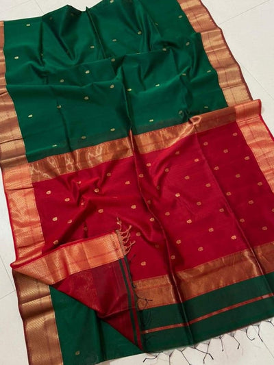 Dark green Maheshwari silk saree with a contrast red flower buti pallu, golden double design zari border and contrast blouse piece.
