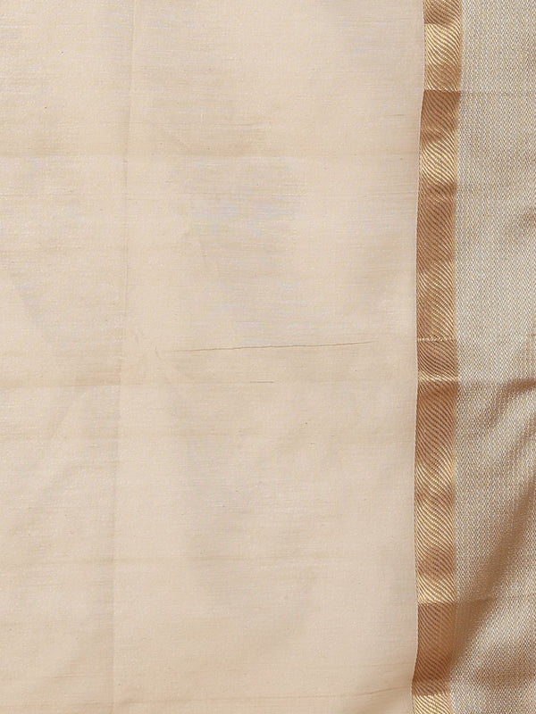 A carved wooden block being pressed by hand onto block printed fabric