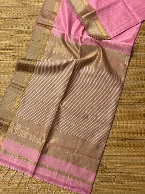 Leafy green handloom Maheshwari silk saree with allover checks and a banded blush and bronze pallu