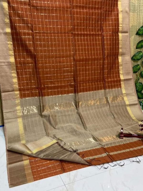 Earthy brown handloom Maheshwari silk saree with allover checks and a wide golden contrast pallu