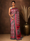 Red and white paisley printed saree with a bold multi-striped pallu, styled with a reference blouse.