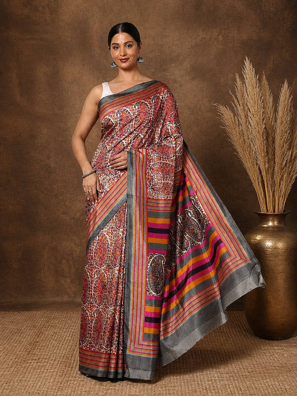 Red, brown and orange paisley and floral printed saree with a wide multi-banded striped pallu, styled with a reference blouse.