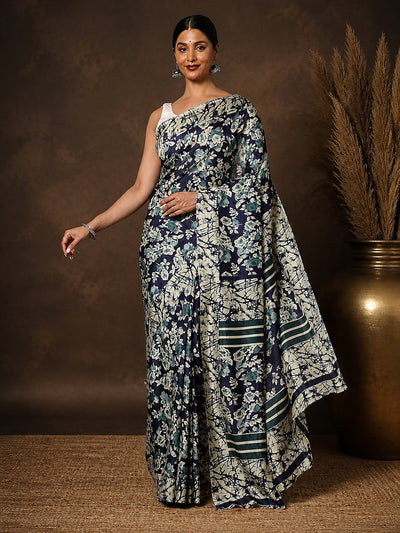 Navy blue and off-white floral printed Kashmiri Silk saree with a crackled texture and teal end-bands on the pallu.