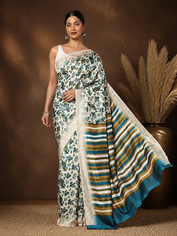 Off White Kashmiri Silk printed saree with an all-over teal and olive botanical leaf print and a wide end-panel of teal, olive-green and dark-brown stripes over an off-white base, with a narrow textured border.