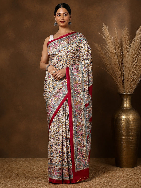 Off White printed Kashmiri silk saree scattered with small Madhubani-style floral sprigs, a wide vertical pallu panel of red elephants, and a narrow deep-red border.