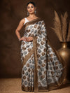 Beige, brown and grey Kashmiri Silk printed saree with a scattered leaf print and a dark graphical end-panel, framed by a wide solid dark-brown border.