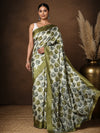 White Kashmiri Silk printed saree with a scattered olive-green and grey leaf print, a dense abstract botanical end-panel, and a wide solid olive-green border.