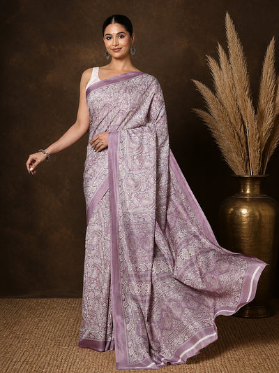 Light lavender printed saree in a fine all-over paisley and floral print with a narrow lavender border.
